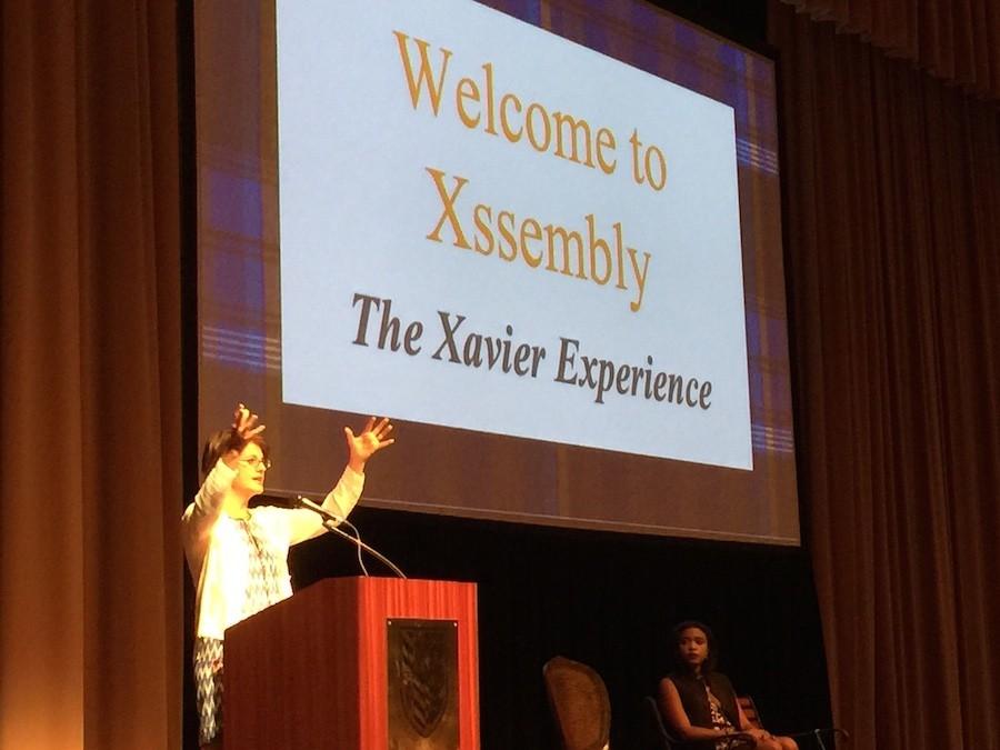 Ms. Kelly Corrigan addresses the Xavier student body.