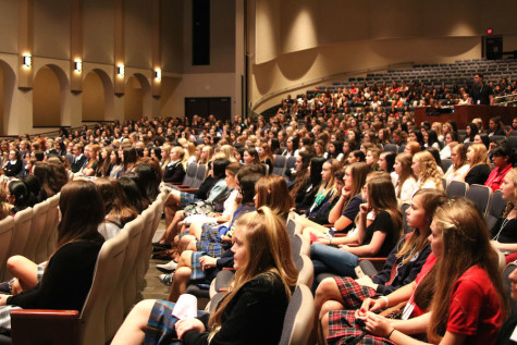 8th graders gather in the Performing Arts Center.