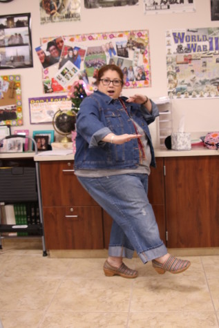 Honors World History teacher, Ms. Nuñez, strikes a kung fu move. 