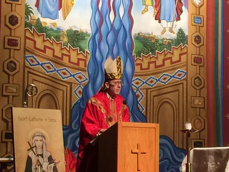 Bishop Olmsted celebrates Mass (and a birthday) at Xavier