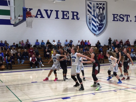 The Xavier Gators take on Red Mountain in an intense game.