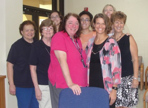 Ms. Donnelly, surrounded by coworkers and friends