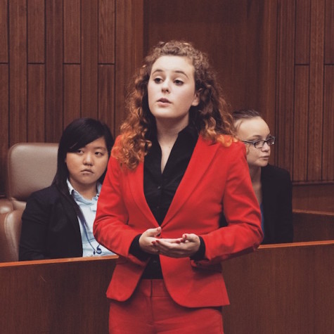 Taylor Lawritson rocking her red suit. 