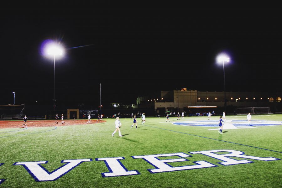The Xavier soccer team battling it out on the field for another win. 