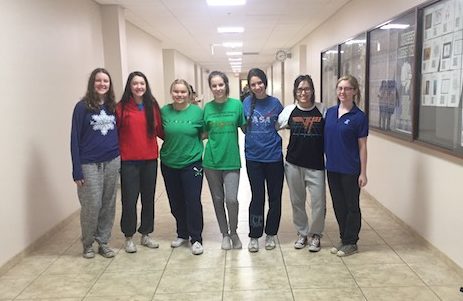 Xavier girls are all smiles on buck-a-sweans day. 