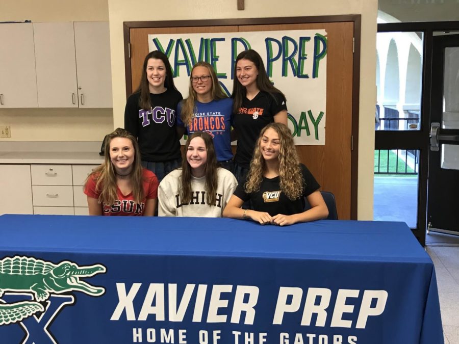Xavier athletes who signed their National Letters of Intent on Nov. 8, 2017.
In the top row is volleyball player Caroline White (left), swimmer Katie McKoy and basketball player Montana Oltrogge (right). In the bottom row is sand volleyball player Kailey Klein (left), softball player Melissa Fedorka and volleyball player Alyna Draper (right).