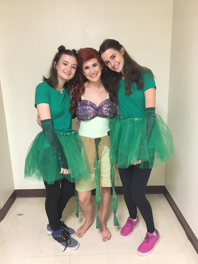 Sophomore Eden Tornquist (left), senior Greer Tornquist (middle) and sophomore Grace McGovern (right) pose for a picture in their Bubble Buddy group. 
