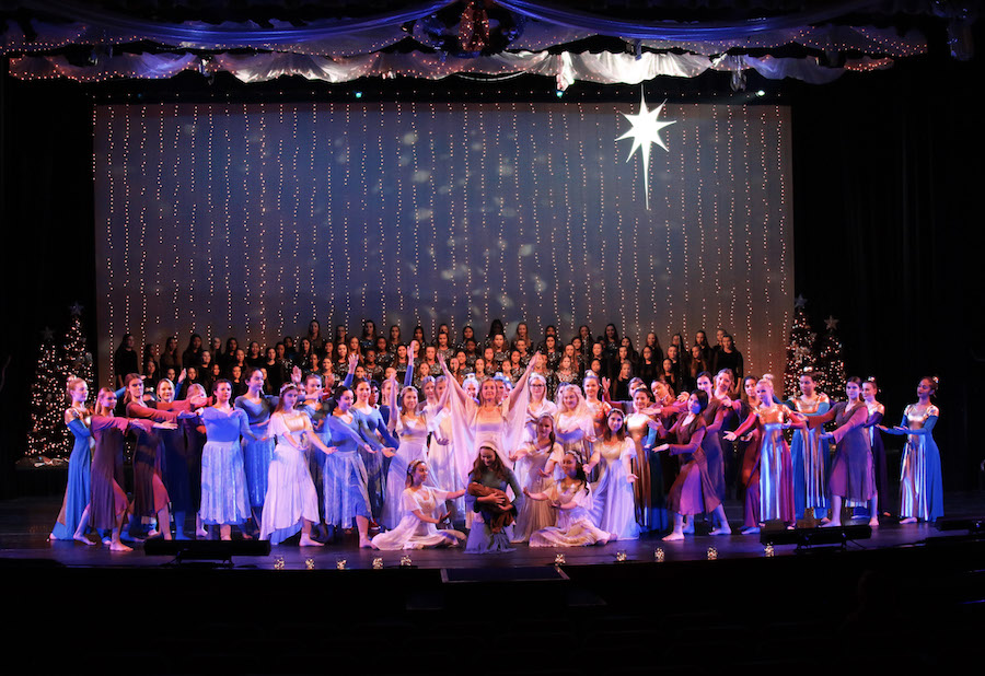 Jacqueline Johnson (center) and Grace McClain (above Johnson) onstage surrounded by Xavier dancers at the fifteenth annual Christmas pageant in the Virginia G. Piper Performing Arts Center on Friday, Dec. 1, 2017.