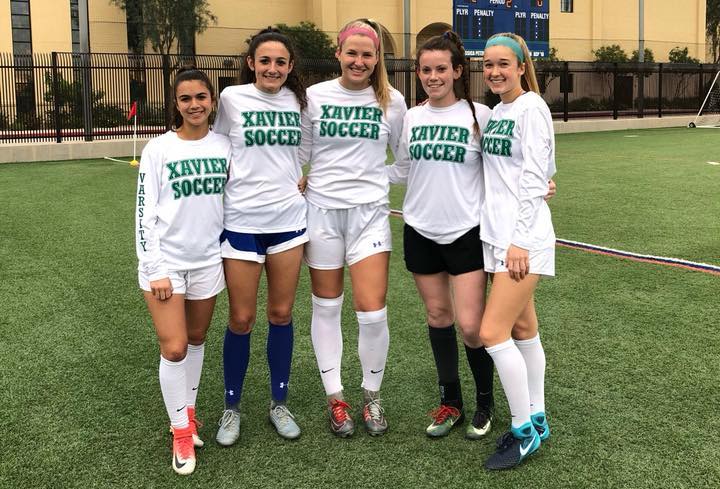 (L-R) Seniors Maddy Chait, Kinsey Ehmann, Nicole Hook, and Abby Hubbard on varsity soccer. 
