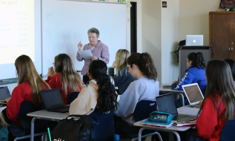 Mrs. Barbra Bond teaches students in the College-Level Accounting class on Feb. 26, 2018.