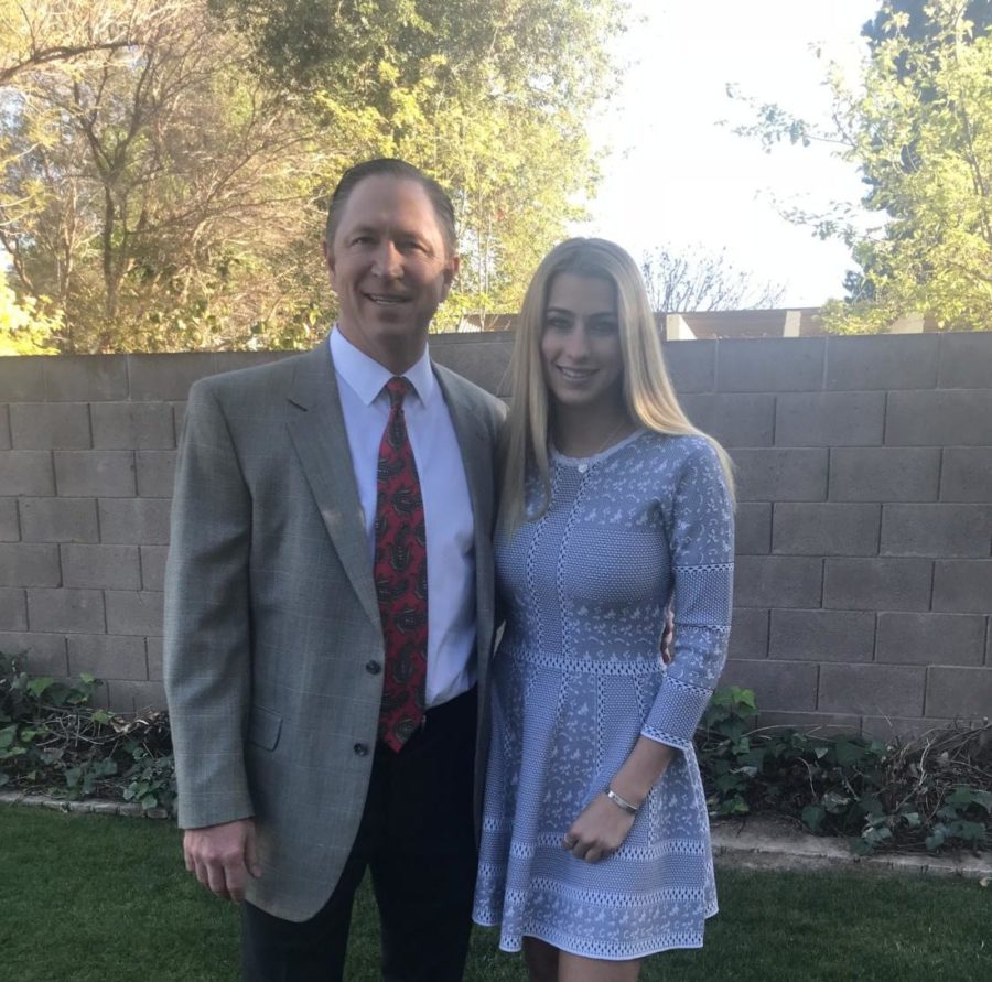 Senior Madelilne Warren and her dad are dressed up to attend the Father-Daughter dance.