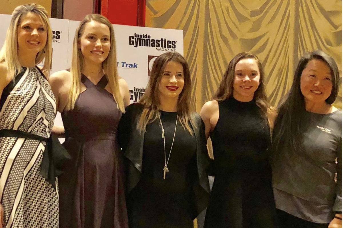 Senior Lauren Stevens beside Inside Gymnastics & Tumbl Trak staff members, 2008 Olympic medalist Alicia Sacramone, and 2-time junior national champion Maile O'Keefe