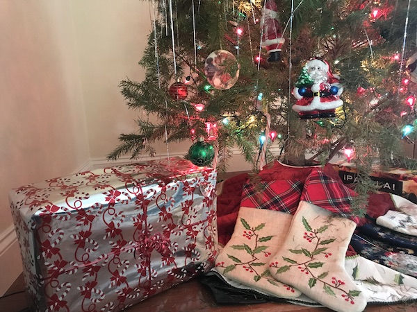 Holiday presents and stockings rest under the tree with plenty of time until Christmas.