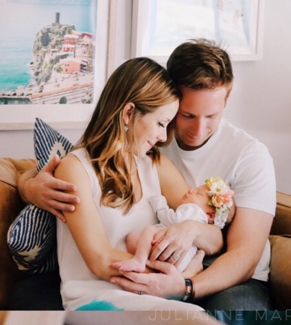 Mr. and Mrs. Long with their daughter, Florence. 