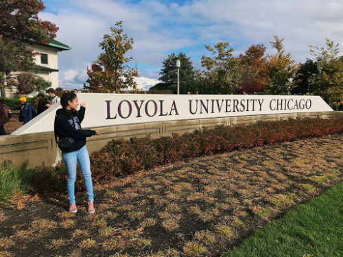 Sienna Martinez ‘21, stands in front of Loyola University Chicago sign on Friday, Nov. 2, 2018.
