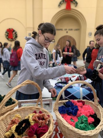Xavier students buying and selling everyones favorite, scrunchies. 