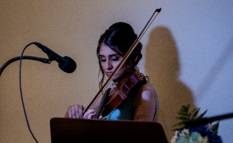 Xavier junior Edyta Zimny playing the violin. Photo by Tobias Ogden of Image in Love Photography.