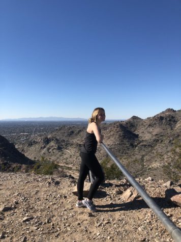 Sophomore Taryn Maher celebrates reaching the top of Camelback Mountain via the Cholla Trail, a popular hike on weekends in Arizona. Photo by Elyse Gifford ‘21.