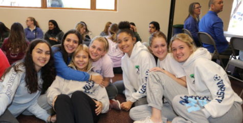 Seniors get cozy in their sweans for their final Prayer Day