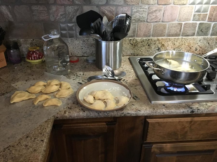 Pierogi boiling in a pot of water. Photo courtesy of Hannah Shulski 19. 
