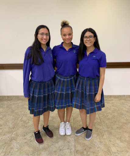 The new skirt length modeled by Eliza Domingez, Kaila Hunley, and Kitzhia Beltran. Photo by Christopher Dorado.