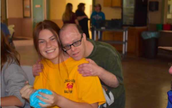 Xavier College Prep Jaden Campbell 21 at the 2019 Camp Civitan with her friend, Ross. 
Photo Credit: Ella Petrine 21