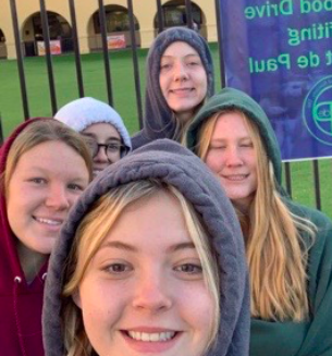 NHS members volunteer in the morning on Thursday, November 5th, 2019 for the Can Food Drive at Xavier College Preparatory in Bidwells Circle.
Photo Credit: Brianna Butkiewicz 20
