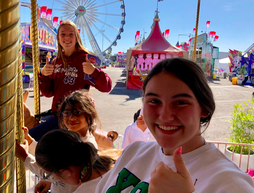 Emmie Paulson ‘21 and Kendall Warner ‘21 attending Kids Day at the Arizona State Fair, located in Phoenix, Arizona. Photo Credit: Camy Rael 20