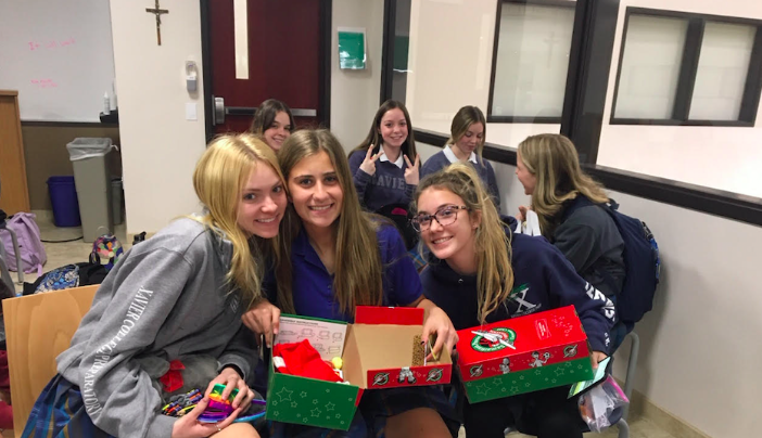 Members of the Key Club gathered after school to pack boxes for Operation Christmas Child
Photo Credit: Mrs. Alison Mead 
