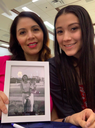 To the right is Alissa Celaya 20’ and her mother Allana Cardenas at Xavier College Preparatory Mother/Daughter Farewell event holding a baby picture of Alissa Celaya 20’ on February twenty-ninth, twenty-twenty. 
Photo Credit:  Alissa Celaya 20’
