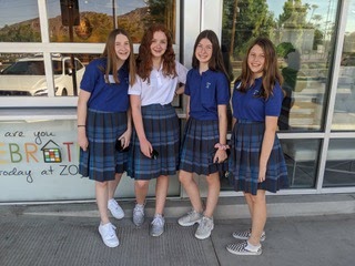 Emily Alaimo ’24, Brianna Oden ’24, Julia Tipsord ’24, and Ellie Jewett ’24 enjoy celebratory frozen yogurt after setting foot on Xavier’s campus for the first time as official students.
