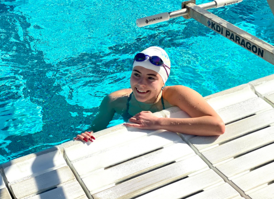 Junior Allegra Wilga reflects on her success in swimming 100 yards for the Swim for the Light fundraiser at Brophy’s pool on December 6, 2020. 
