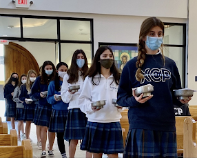 Xavier Gators volunteer as altar servers to celebrate Mass in the Xavier chapel. 

