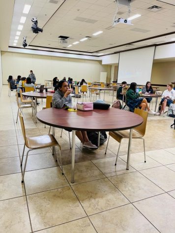 Xavier girls eat their lunch while watching the movie “Mulan” for Women’s History Month. 