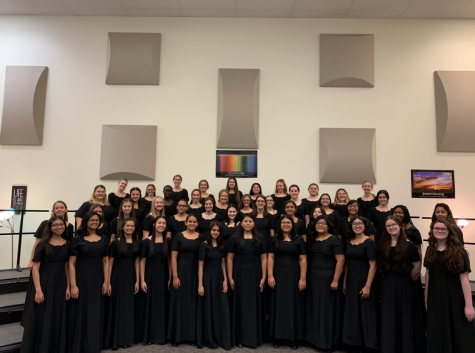 Singing with the rest of the Honors Choir, Piper Ringwald performs with the other girls. They performed in a choir concert in the Performing Arts Center.