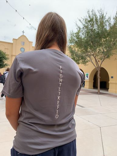 Junior Isabel Hycnar, wears her “Fight Like Flo” shirt to school on Wednesday, September 29, 2021. The Xavier softball team members wore their “Fight like Flo” shirts to honor their beloved teammate Kylie Rodgers.