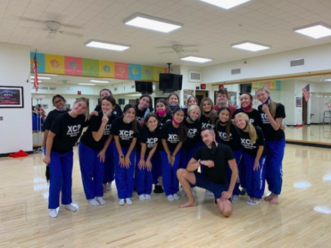 Xavier’s Performance Dance class poses with New York choreographer, Aaron McGloin. The dancers worked with McGloin for a week and will perform this exciting piece in the near future.