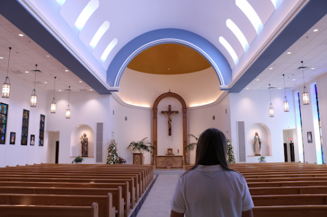 Sophomore Kali Riddell steps inside of Xavier’s Chapel of Our Lady. Kali is a part of five students looking to receive the initiation sacraments of the Catholic Church.