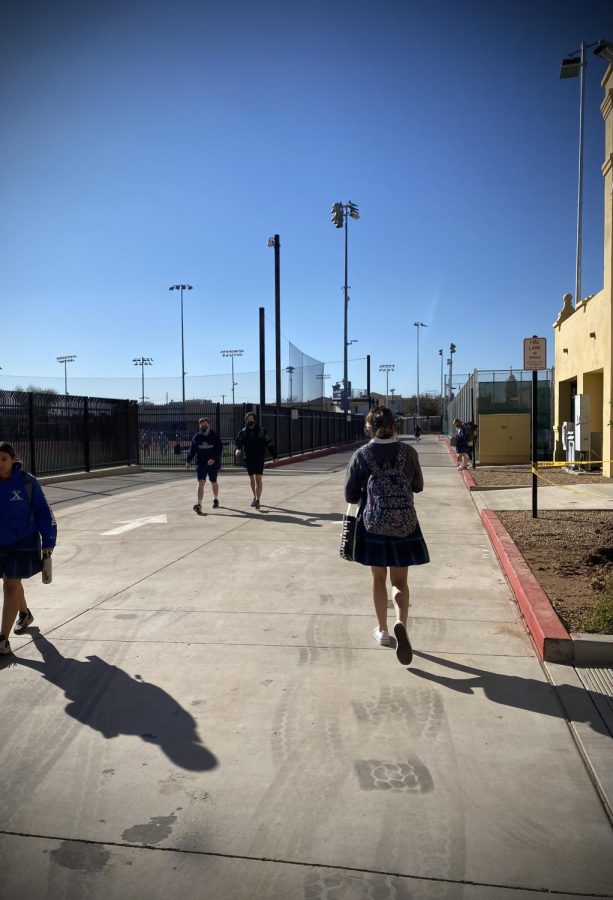 Brophy and Xavier students walk down Winsor Way to their off-campus classes. Winsor Way was named after Xavier’s Sister Lynn Winsor and has served as a path for students to travel between the Xavier and Brophy campuses. 