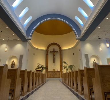 The placid chapel at noon is alone yet alive with the sun piercing through the windows and lights emphasizing Jesus. Xavier's Chapel of Our Lady is a place of communion and prayer for all its students.
