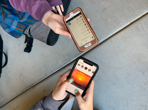 Sitting outside during lunch, two Xavier students, Lily Nelles ’23 (top) and Sophie Saia ’23 (bottom) display their favorite social media platforms and their influencers. Saia watches mindfulness and wellness posts to uplift her mentality and Nelles messages her friends, using social media as a way to promote self-wellness. 