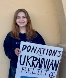 Eleanor Halaby ‘24 poses with her Ukraine fundraiser poster. She along with Tess Morrison raised $2300. 