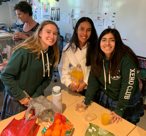 XERO Club officers Reyna Silva 23, Alma Melendez 23 and Isabella Zacarias 23 prepare for the clubs Earth Day party. The celebration included watching Seaspiracy and voting for next years officers.
