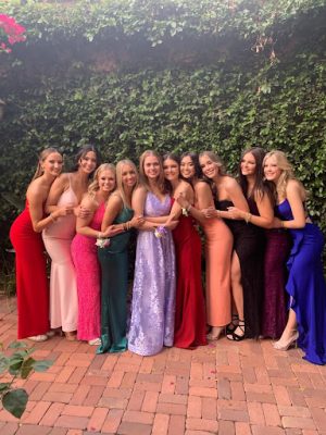 Xavier seniors gather for a friend-group photo before heading off to their final prom. They were ready to light up the Brophy dance floor one last time.