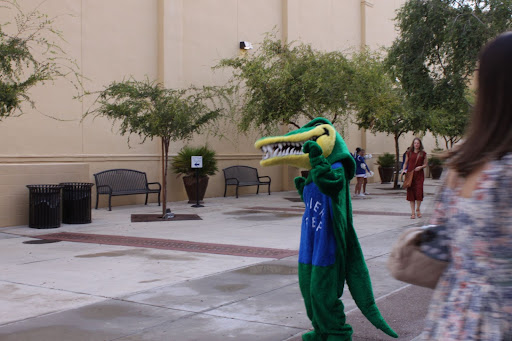 Xavier alumnae and family snap pictures of Ali the Alligator and Spiritline cheerleaders before attending the annual X-Breakfast on the Xavier campus. Guests gathered to support the Xavier Fund with the goal of helping students receive financial aid. 