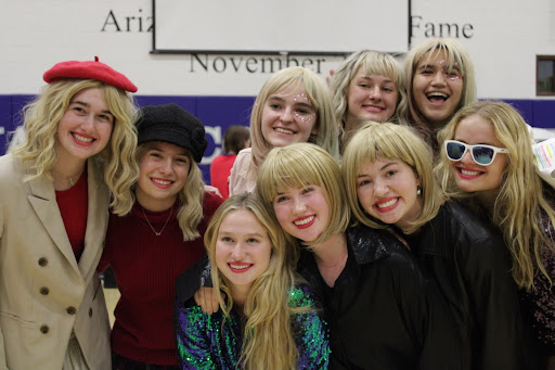 Executive Student Council Board members smile in their Taylor Swift costumes after successfully completing the first rally of the 2022-2023 school year, “The Battle of the Taylors.” All the hard work they put into the preparation of the rally paid off. 
