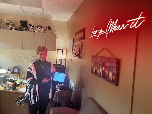 Dean Denise Macrina shows the new tardy system, which was a catalyst for the new referral system.  Hopefully, Xavier students visit her inviting office out of choice, and not because of infractions. 