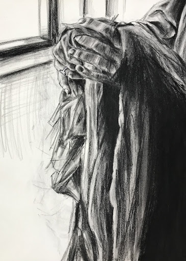 “Waiting,” a charcoal piece by AP Studio Art student Mary Virgina Vietor. This piece was made from an all-class prompt given to students by instructor Alison Dunn.