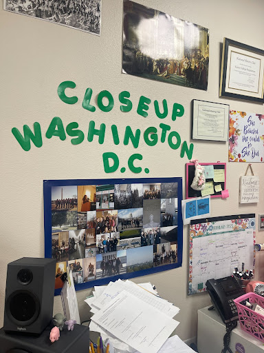 Xavier teacher and CloseUp Moderator Gina Nunez displays a Washington D.C. photo collage in her classroom for students to see. The photos on the board are dated from the early 2000s when Nunez revived Xavier’s participation in the program, starting with only five students. 