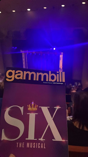 The “SIX” ASU Gammage gammbill is held in front of the national tour set. “SIX” came to Gammage from October 4-9, 2022. 
